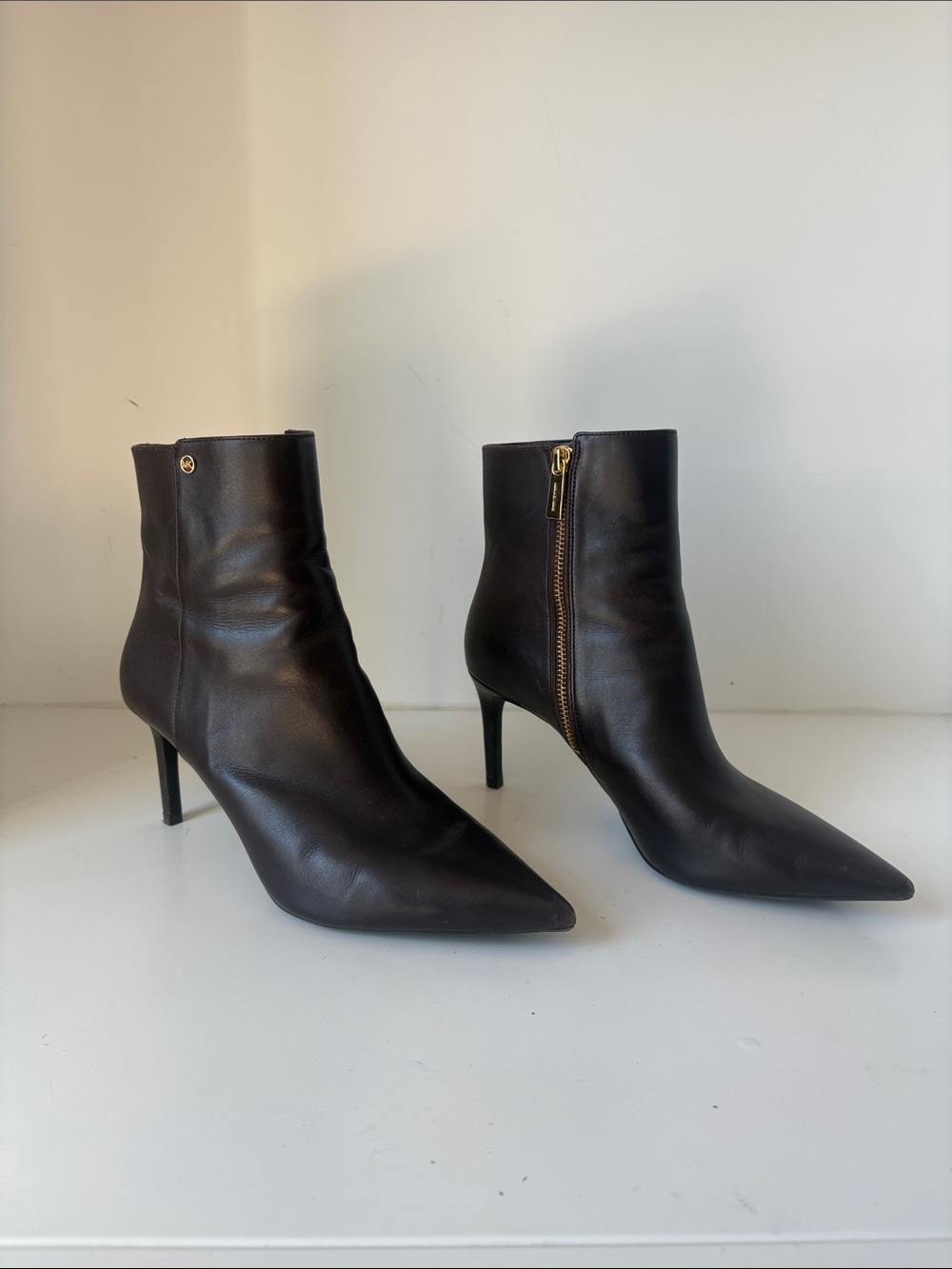 Michael Kors Black Pointed Leather Ankle Booties with Gold Zip Detail